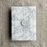 "Steel blue poppy floral toile printed vellum wrap for 5x7 card | pack of 10" - Invitation Jackets and Overlays in blue by Ivory Invitations