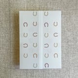 "Brown shades horseshoes vellum wrap for 5x7 card | pack of 10" - Invitation Jackets and Overlays in multicolorassorted-colors by Ivory Invitations