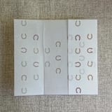 "Brown shades horseshoes vellum wrap for 5x7 card | pack of 10" - Invitation Jackets and Overlays in multicolorassorted-colors by Ivory Invitations