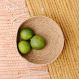 "Desert Flower Jute Tray" - Decorative Storage in natural by Moriah Okun