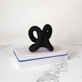 "Infinity Loop Table Sculpture- Black" - Original Sculpture in black by Bharti Trivedi