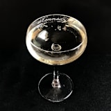 "Engraved Champagne Coupe Glass" - Glassware in clear by Charlotte Noordzij