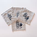 "Cowboy Boot on Gingham Cocktail Napkin Set" - Napkins in beige by Julie Peach