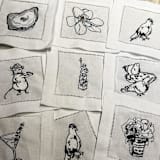 "Embroidered Linen Magnolia Cocktail Napkins, Set of 4" - Napkins in white by Ashley Myers