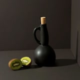"Stoneware Olive Oil Dispenser | Dadasi 15 oz" - Serving Accessories in black by Powered By People