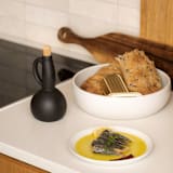 "Stoneware Olive Oil Dispenser | Dadasi 15 oz" - Serving Accessories in black by Powered By People
