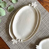 "Frills Platter" - Serving Platters and Trays in white by Sidney Field
