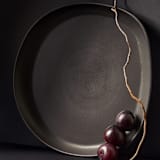 "Stoneware Round Serving Platter" - Serving Platters and Trays in black by Powered By People