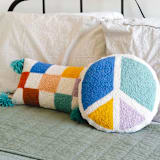 "Peace Shaped Hook Pillow" - Throw Pillows in multicolor by Ampersand Design Studio
