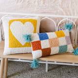 "Cut Out Heart Hook Pillow" - Throw Pillows in yellow by Ampersand Design Studio