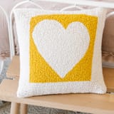 "Cut Out Heart Hook Pillow" - Throw Pillows in yellow by Ampersand Design Studio