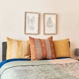 "Chokor Nira Brown Pillow" - Throw Pillows in brown by Anjali Purohit