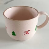 "Hand-Painted Blush Stoneware Mug with Decorative Christmas Bows and Trees, Red and Green" - Mugs and Teacups in pink by Nicoletta Savod