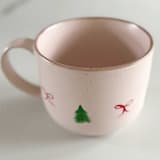 "Hand-Painted Blush Stoneware Mug with Decorative Christmas Bows and Trees, Red and Green" - Mugs and Teacups in pink by Nicoletta Savod