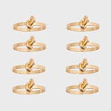 "Knot napkin rings, set of eight" - Tabletop Accessories in brass by Joanna Buchanan