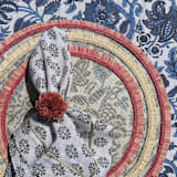 "Straw pompom napkin rings, pink, set of four" - Tabletop Accessories in pink by Joanna Buchanan