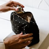 "Medium Cross-Stitch Toiletry Bag - Charcoal" - Makeup Bag in black by Anchal