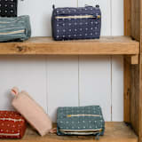 "Medium Cross-Stitch Toiletry Bag - Rust" - Makeup Bag in red by Anchal
