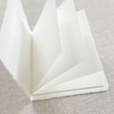 "Debossed Print Vow Books - Set of 2" - Wedding Vow Books in white by Maria Ferrer G.