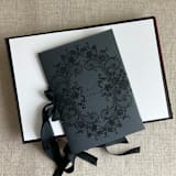 "Black floral lace print black and burgundy vellum covered vow books | SET of 2 books | includes 1 her vows and 1 his vows" - Wedding Vow Books in black by Ivory Invitations