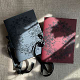 "Black floral lace print black and burgundy vellum covered vow books | SET of 2 books | includes 1 her vows and 1 his vows" - Wedding Vow Books in black by Ivory Invitations