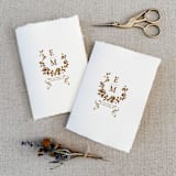 "Floral Monogram His and Hers Vow Books - Set of 2" - Wedding Vow Books in beige by Jen Simpson
