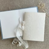 "White ink floral lace print vellum covered vow books | SET of 2 books | includes 1 her vows and 1 his vows" - Wedding Vow Books in blue by Ivory Invitations
