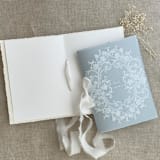 "White ink floral lace print vellum covered vow books | SET of 2 books | includes 1 her vows and 1 his vows" - Wedding Vow Books in blue by Ivory Invitations