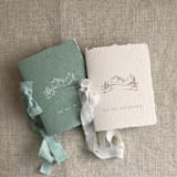 "Green mountain wedding vow books | Set of 2 books | includes 1 her vows and 1 his vows" - Wedding Vow Books in green by Ivory Invitations