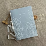 "White ink PRINT on vellum covered English botanical garden Vow Book 5x7 inches | 1 book | OUR VOWS" - Wedding Vow Books in blue by Ivory Invitations