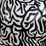 "stoneware vase with black and white maze pattern" - Vases in black by Liz Vigoda