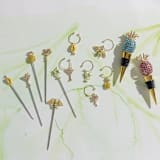 "Tropical cocktail picks" - Wine and Bar Tools in gold by Joanna Buchanan