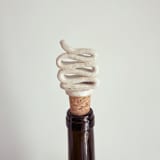 "Wine Topper - Ribbon" - Wine and Bar Tools in white by Sidney Field