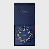 "Zodiac wine charm gift set" - Wine and Bar Tools in gold by Joanna Buchanan