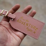 "& So the Adventure Begins Luggage Tags | Dusty Rose, Quantity of 5" - Favors in pink by Melanie Fletcher