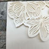 "Qty of 50 Custom Ivory Shimmer Exquisite Flower Tri-fold Laser Cut with Inside Pocket | Other Color Options Available" - Invitation Pockets in pink by Papel Custom Design