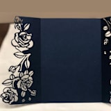 "Qty of 50 Custom Navy Shimmer Special Asymmetric Rose Design Laser Cut | Other Color Options Available" - Invitation Pockets in beige by Papel Custom Design