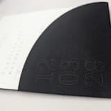 "Textured, Embossed, Curved Invitation Pocket, Qty 10" - Invitation Pockets in black by The Savage Label