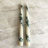 "Ivory with Greenery and White Floral Hand-Painted Taper Candles, Set of 2" - Candles in beige by Ashley Myers