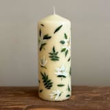 "Ivory Pillar with Magnolia Flowers and Greenery, Set of 1" - Candles in beige by Ashley Myers
