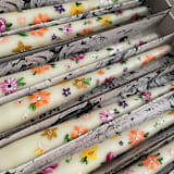 "Ivory with Multicolor Flowers Hand-Painted Taper Candles, Set of 2" - Candles in multicolorassorted-colors by Ashley Myers