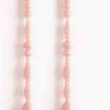 "SET OF 2 - SPINDLE LEG TAPERS // ROSEWATER" - Candles in pink by borrowed BLU