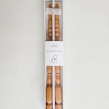 "SET OF 2 - SPINDLE LEG TAPERS // ORO" - Candles in yellow by borrowed BLU