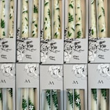 "Ivory with Magnolia Floral Hand-Painted Taper Candles, Set of 2" - Candles in white by Ashley Myers