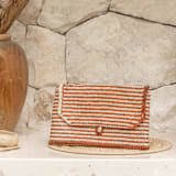 "Patterned Clay Stripes Rattan Clutches" - Bridal Clutches and Purses in red by Suzanne Seick