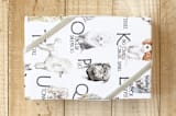 "A dictionary of dogs" - Wrapping Paper in White by Lauren Rogoff - Front