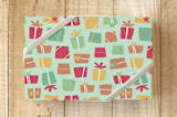 "Happy Presents" - Wrapping Paper in Mint by Olivia Goree - Front