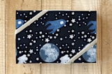 "To the Moon and Beyond" - Wrapping Paper in prussian blue by raven erebus - Front
