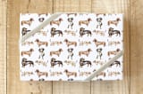 "Doxie Wrapping Paper" - Wrapping Paper in White by Lauren Rogoff - Front