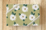 "Southern Magnolia Pattern" - Wrapping Paper in Gold by Lauren Hughes - Front